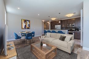 Marlton apartment for rent - A living room with a couch, chairs, and a coffee table.