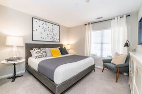 Milford apartment for rent - a bedroom with a bed and a window at Merion Milford Apartment Homes, Milford, CT 06460