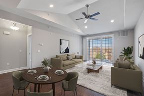 Pennsauken apartment for rent - A modern dining room with a round table set for six.