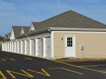 The outside of a building with white doors