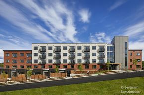 Bellingham apartment for rent - a rendering of an apartment complex with a blue sky in the background