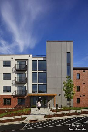 Bellingham apartment for rent - a woman is walking in front of a building