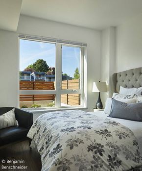 Bellingham apartment for rent - a bedroom with a large bed and a large window