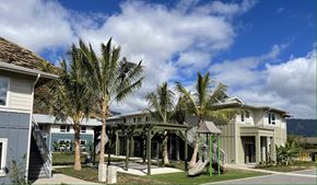 Walanae apartment for rent - A playground area is located in front of a two-story house.