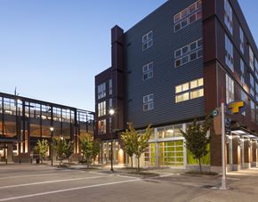 Seattle apartment for rent - a view of the building at dusk