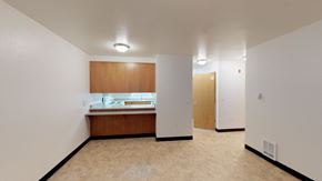 Bellingham apartment for rent - A room with a kitchenette and two doors.