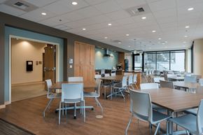 Kirkland apartment for rent - A conference room with a long table and chairs.