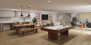 Mercer Island apartment for rent - A modern living room with a pool table and a kitchen area.