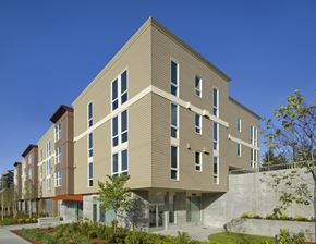 Bellevue apartment for rent - A modern building with a mix of beige and brown panels.