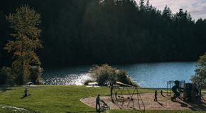 Bellingham apartment for rent - A park with a playground and people enjoying the outdoors.