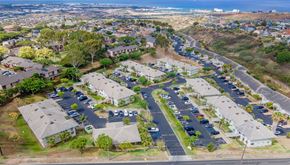 Kapolei apartment for rent - an aerial view of a neighborhood of houses with cars parked