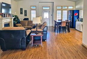 Ellensburg apartment for rent - A living room with a fireplace and a couch.