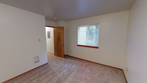 Bellingham apartment for rent - an empty living room with a window and a door