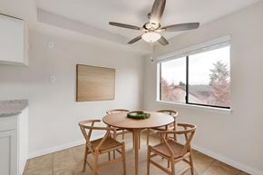 Burien apartment for rent - A dining room with a table and chairs.