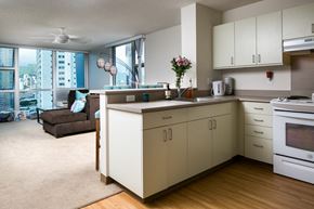 Honolulu apartment for rent - an open kitchen and living room with a view of the city