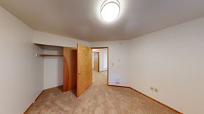 Bellingham apartment for rent - a bedroom with a closet and a door to a bathroom