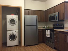 Everett apartment for rent - a kitchen with a washing machine and a refrigerator