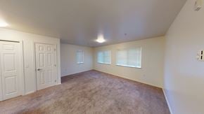 Bellingham apartment for rent - an empty living room with a white door and a window