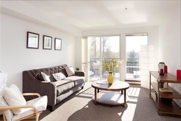 Auburn apartment for rent - a living room with a couch and a coffee table