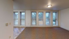 Bellingham apartment for rent - the living room of an empty house with windows