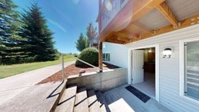Bellingham apartment for rent - A house numbered 23 with a white exterior and a wooden porch.