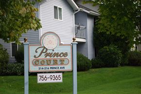 Bellingham apartment for rent - a sign for prince court in front of a house
