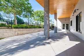 Bothell apartment for rent - A modern building with a wooden roof and a concrete floor.