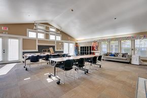 Sammamish apartment for rent - A conference room with a long table and chairs.
