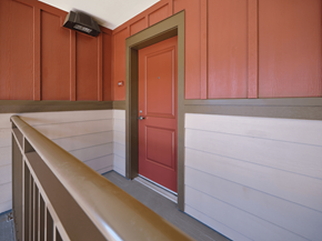 Waikoloa Village apartment for rent - A red door is in a white wall.