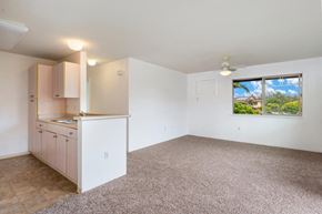 Kapolei apartment for rent - an empty kitchen and living room with a window