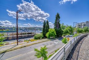 Seattle townhouse for rent - A street view with a clear sky and a few clouds.