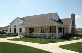 Norwalk apartment for rent - a white house with a porch and a porch swing