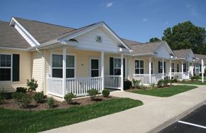 Norwalk apartment for rent - A row of houses numbered from 16 to 18.