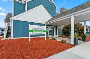 Detroit apartment for rent - The front of a building with a sign that says Good Homes Clubhouse.