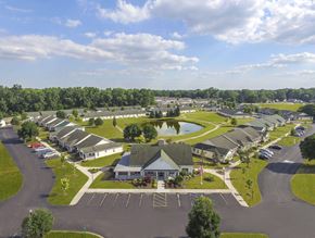Toledo apartment for rent - A large, well-maintained residential complex with a central building and multiple houses.