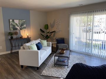 Indianapolis apartment for rent - A living room with a white couch and a coffee table.