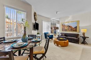 Phoenix apartment for rent - a living room with a dining room table and a couch