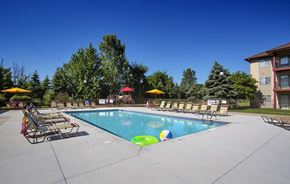 Mount Pleasant apartment for rent - A swimming pool with a few chairs around it.