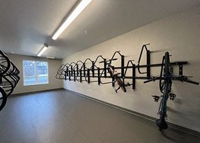 St. Louis Park apartment for rent - a room filled with bikes on a wall