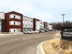 Mankato apartment for rent - A parking lot in front of a building named Dublin Heights.