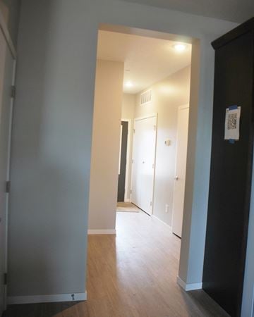 Northfield townhouse for rent - a view of the hallway from the living room into the bedroom and bathroom