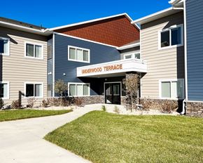 Lake City apartment for rent - a building with a sign that reads