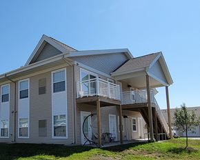 Le Sueur townhouse for rent - a house with a deck on the side of it