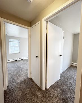 Mankato apartment for rent - an empty bedroom with two doors and a window