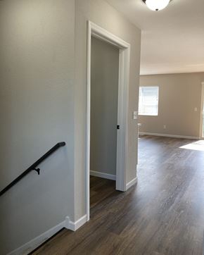 Belle Plaine townhouse for rent - a photo of the hallway and living room of a 560 square foot, 1 bedroom apartment at