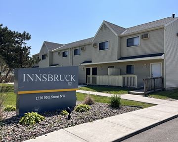 Rochester apartment for rent - A sign for Innsbruck is in front of a building.
