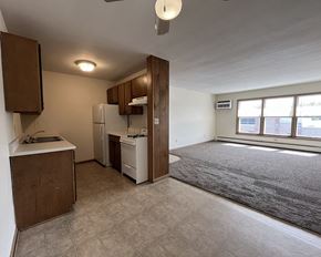 Mankato apartment for rent - an empty kitchen and living room in an empty apartment