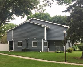 North Mankato townhouse for rent - A grey house with the number 1840 on it.