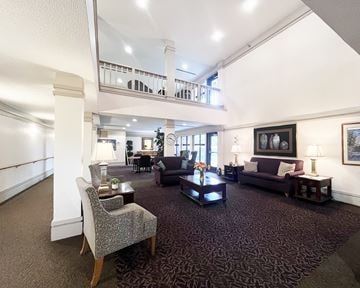 Hastings apartment for rent - A living room with a grey carpet and furniture.