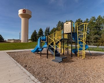 Jordan townhouse for rent - a playground with a water tower in the background